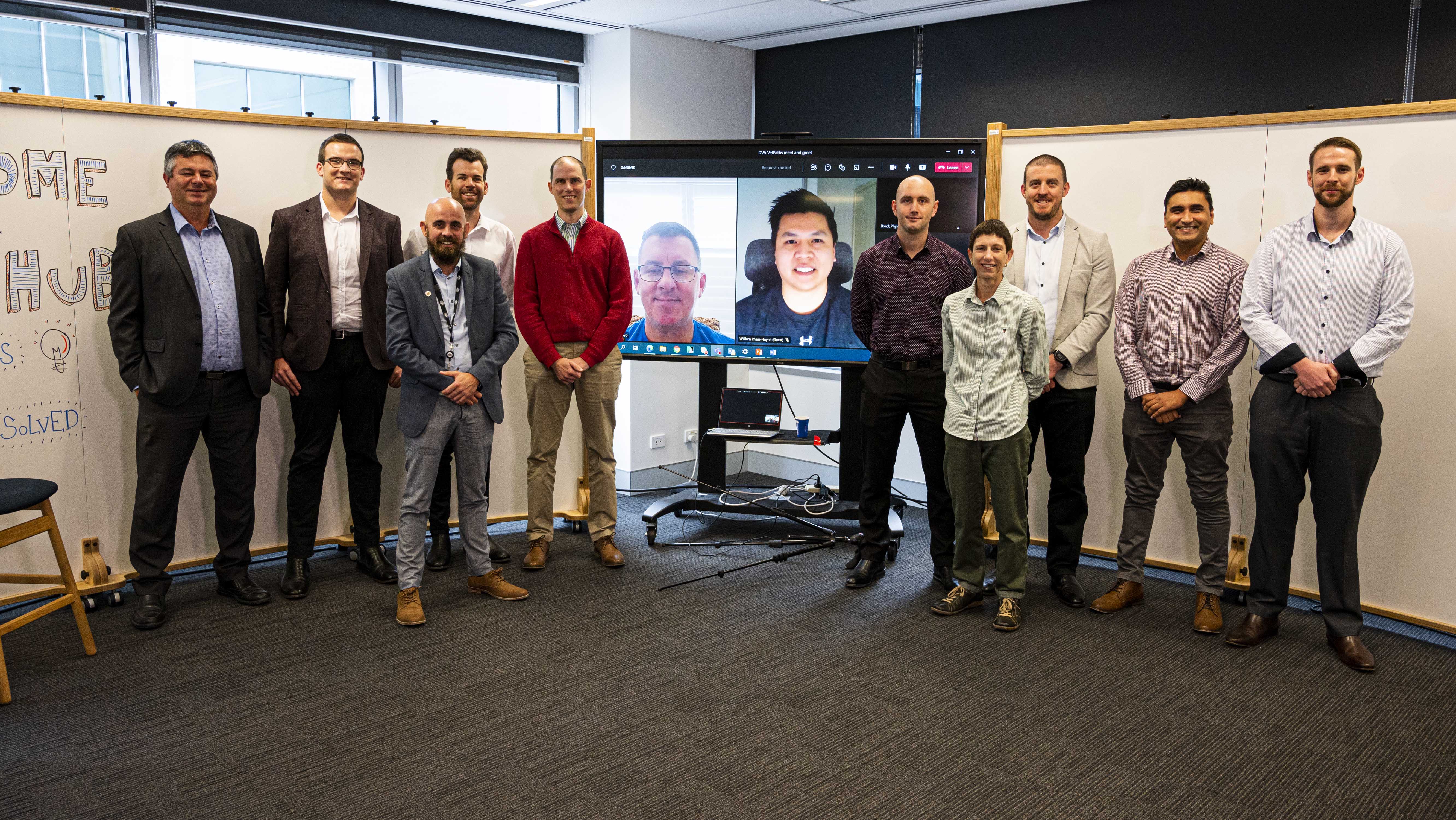 The first Cohort of DVA’s Veteran Employment Pathway participants from left to right: Tony (APS Academy), Kallum, Mick (DVA, coordinator), Brett, Steve, Jason (screen), William (screen), Liam, Erika, James, Sisir and Adam. (absent: Alaric and Tina)