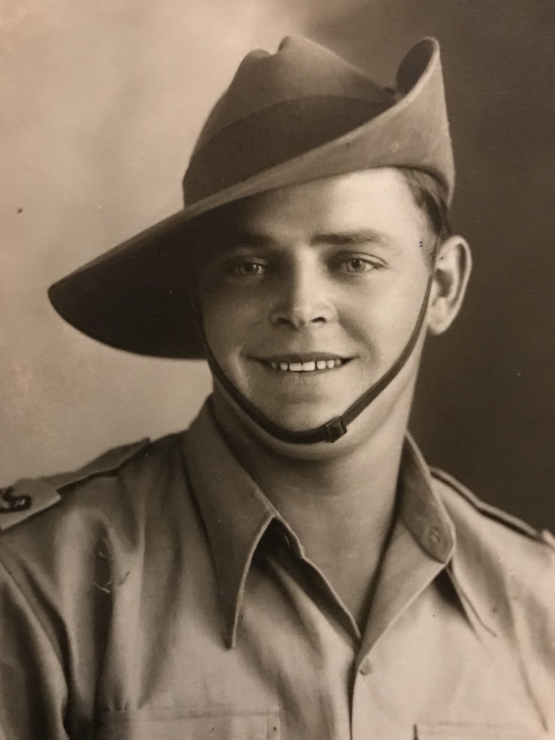 Black and white photo from 1940s of young man in Army uniform