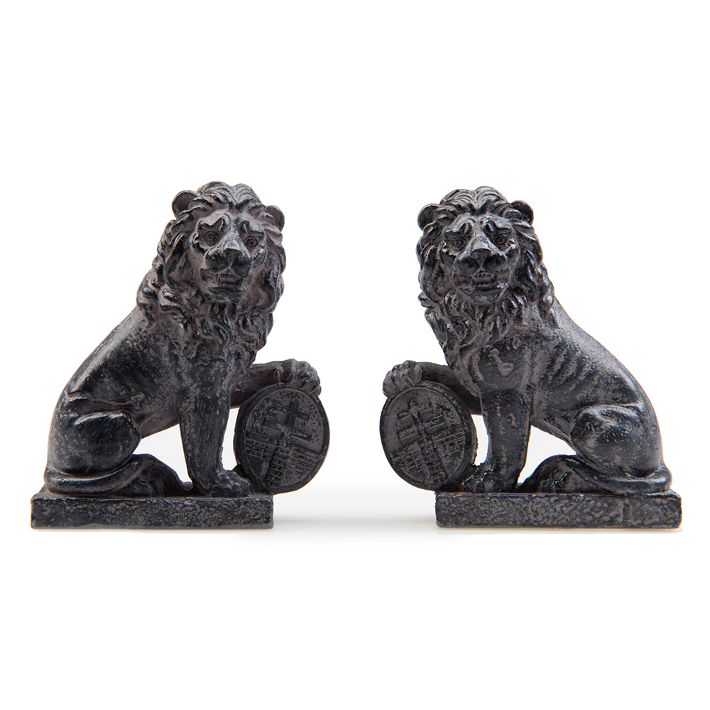 A pair of black shiny lions