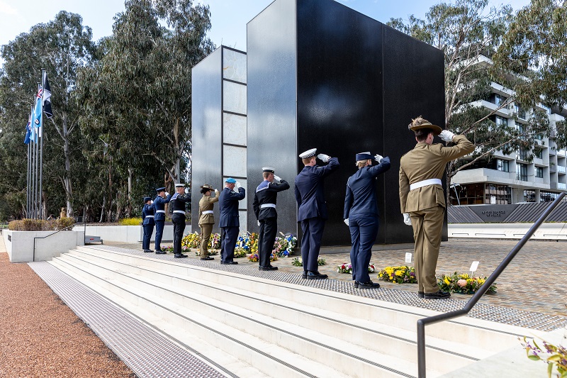 Federation Guard saluting at memorial