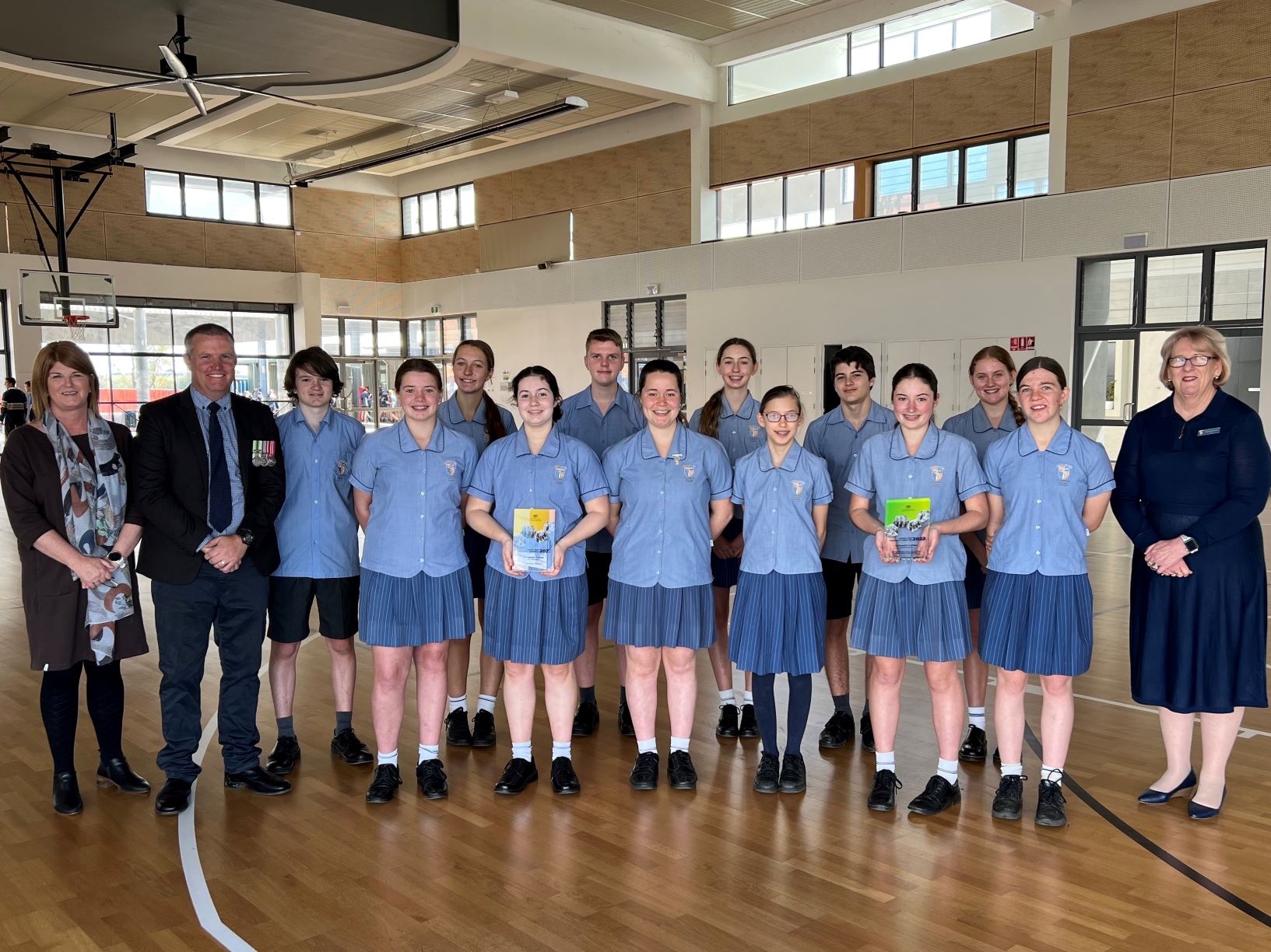 Award-winning St Joseph’s College Year 9 students with (left to right) teacher Vikki Jordan, veteran peacekeeper and agriculture teacher Simon Ramage and Principal Patricia Hales.