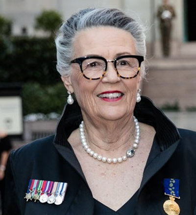 Portrait photo of older woman wearing Order of Australia Medal