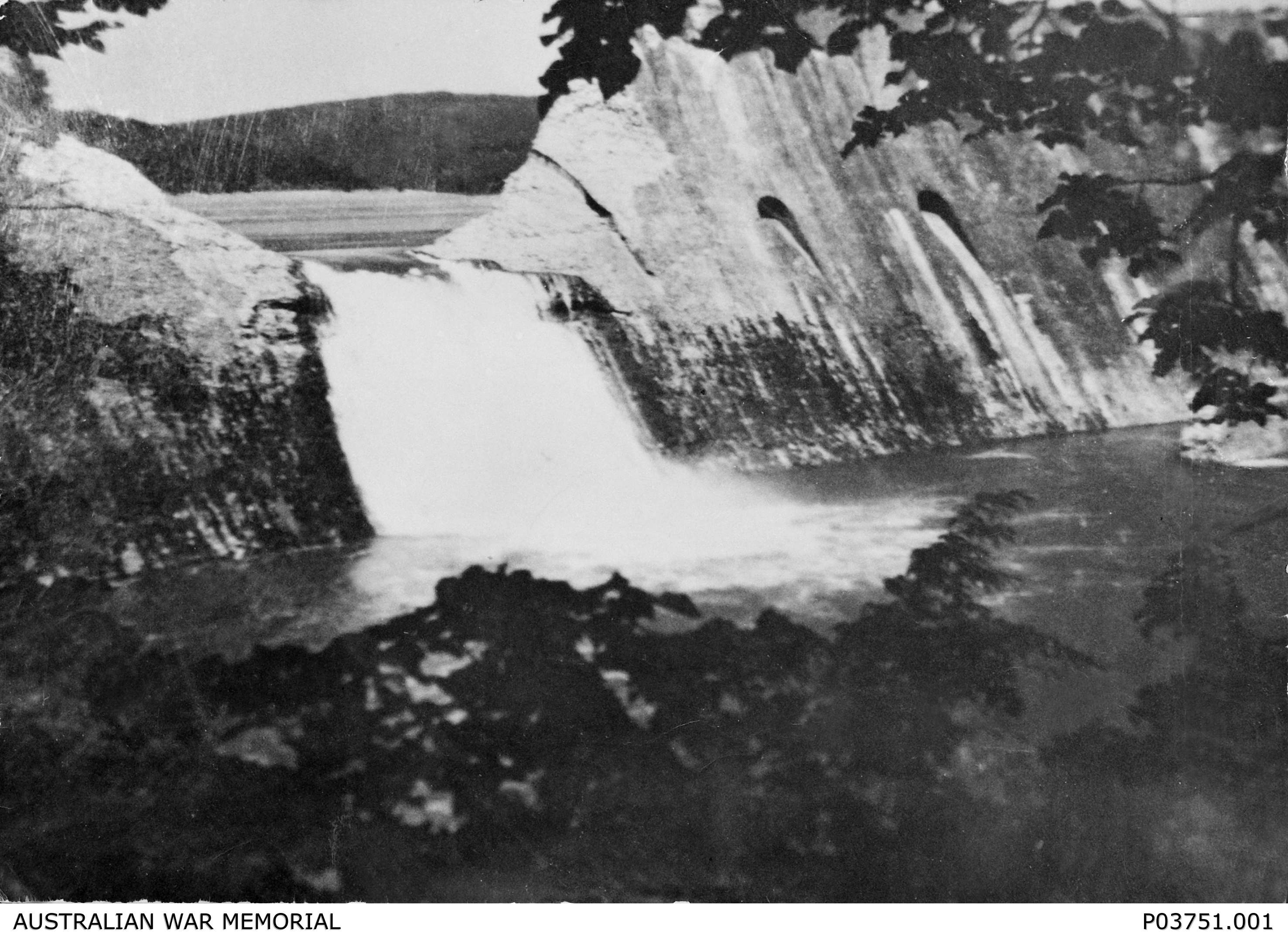 The Eder Dam after it was breached by bouncing bombs dropped by specially modified Lancaster bombers of 617 Squadron RAF. AWM