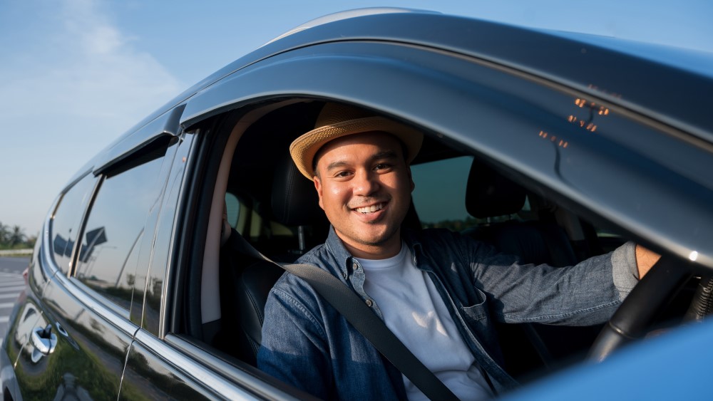 Young man in car