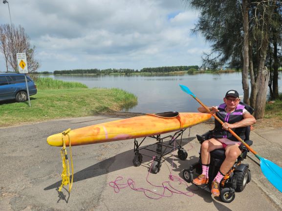 Pauly Rainbow with canoe