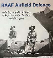 RAAF Airfield Defence. Two soldiers sitting on the top of the war airplane.