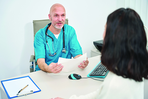 Woman visiting male doctor