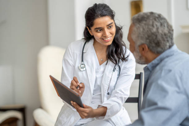 female doctor with senior male