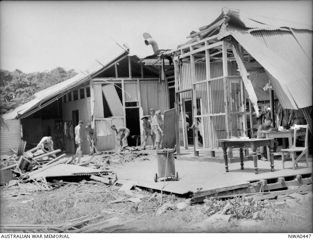 Australian servicemen in Darwin repairing a bombed building after the second air raid by Japanese warplanes on 19 February 1942.