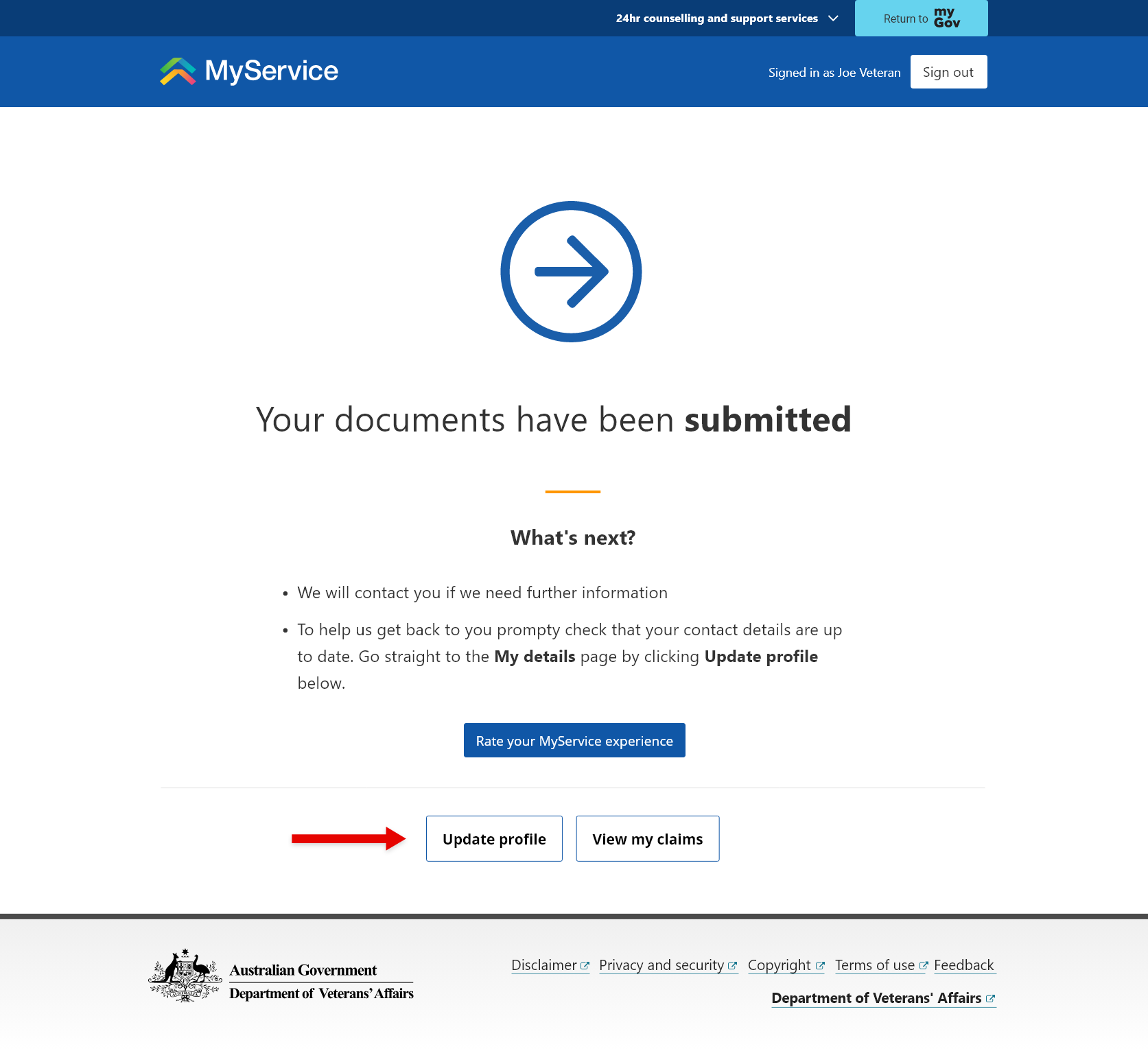 'Your documents have been submitted' screen. Red arrow pointing to the 'Update profile' link.