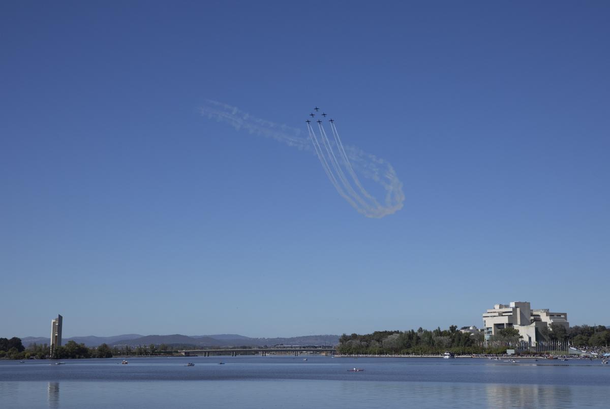 Six airforce jets in formation fly over Lake Burley Griffin